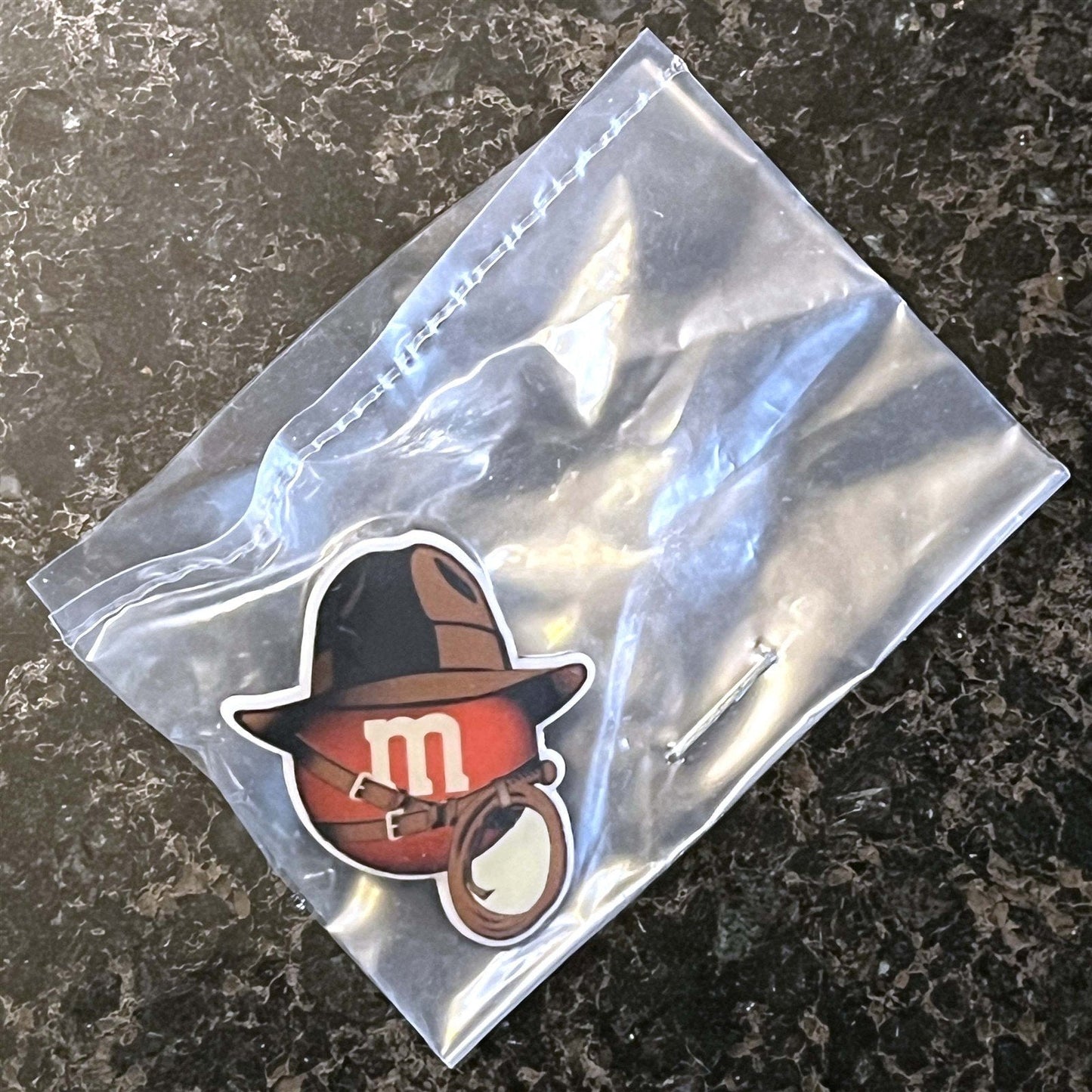 2008 promotional M&M's INDIANA JONES lapel pin